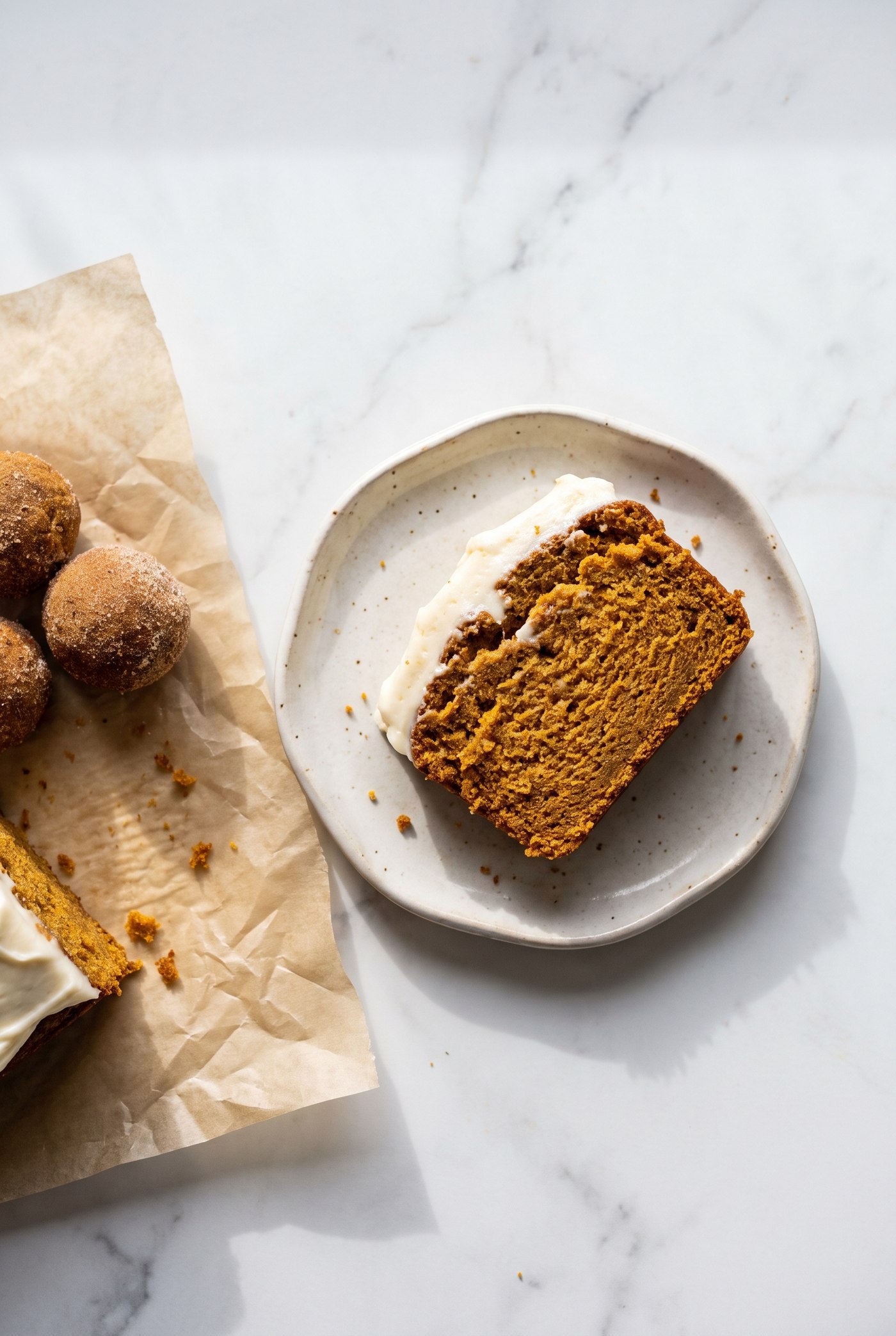 Autumn desserts including pumpkin loaf, cinnamon donuts and carrot cake bites